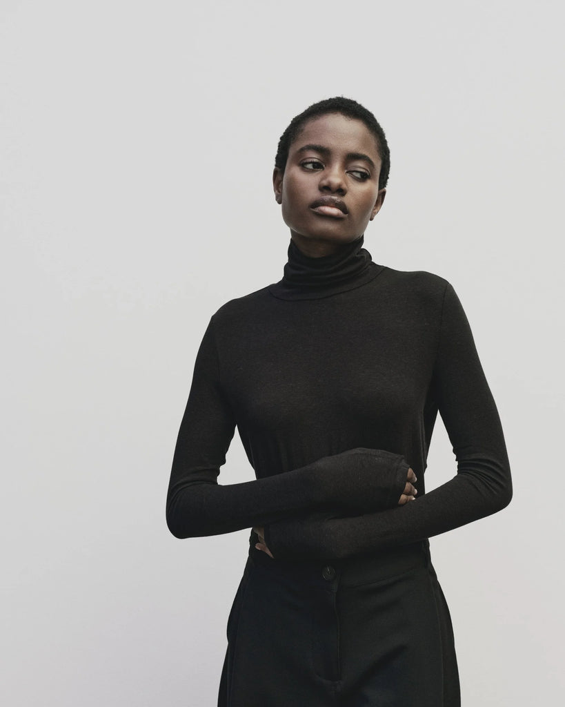 ROLL NECK JERSEY TOP IN BLACK